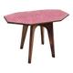 Small Scandinavian side table with wood and pink tiles, with tapered legs.