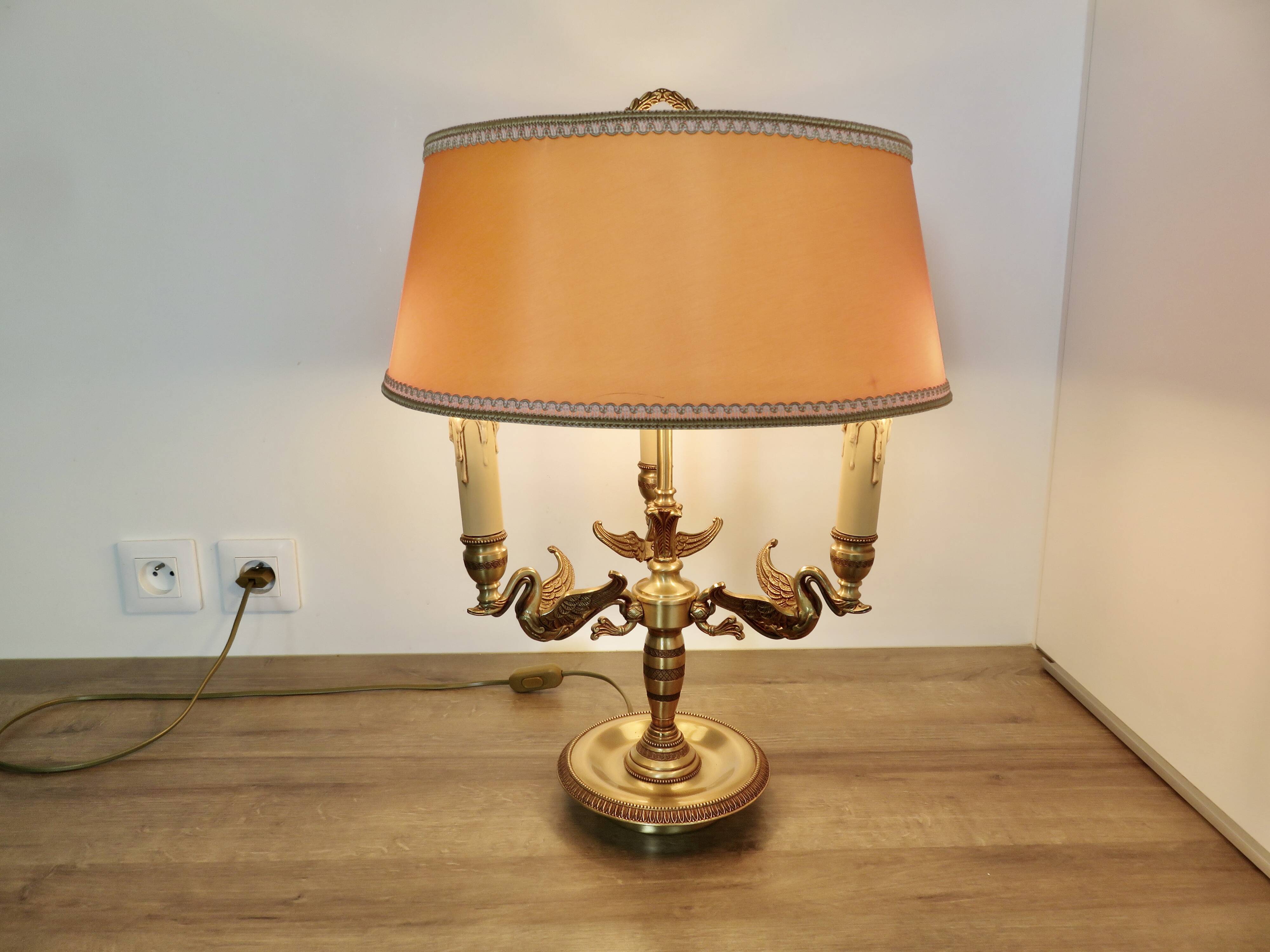 Lucien Gau empire style lamp in solid bronze gilded with bright gold "with swans"