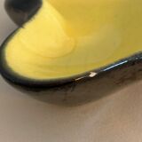 Yellow and black ceramic ashtray
