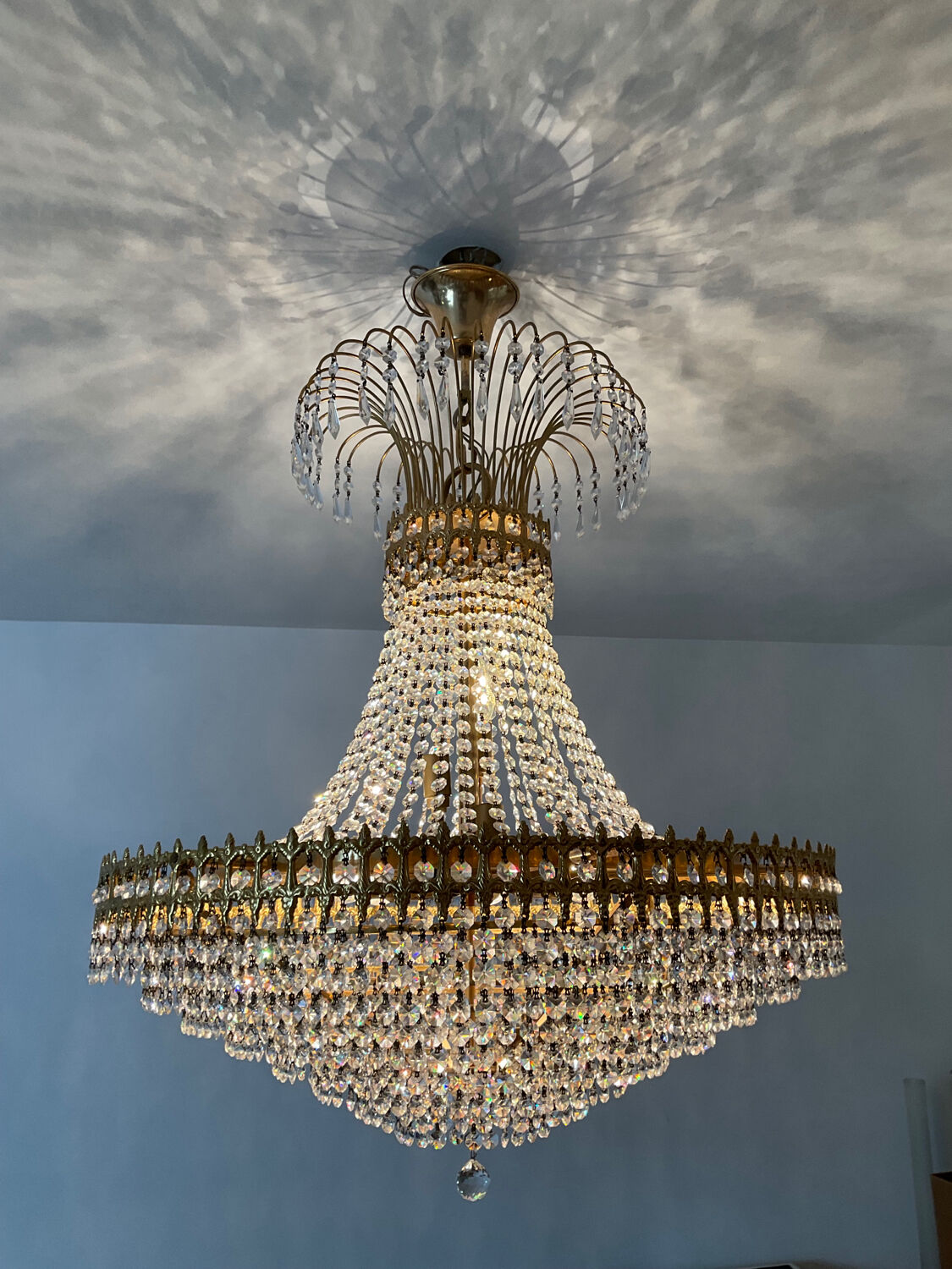 Brass chandelier and crystal tassel waterfall