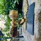 Wall light with 2 branches in baroque brass lion design.