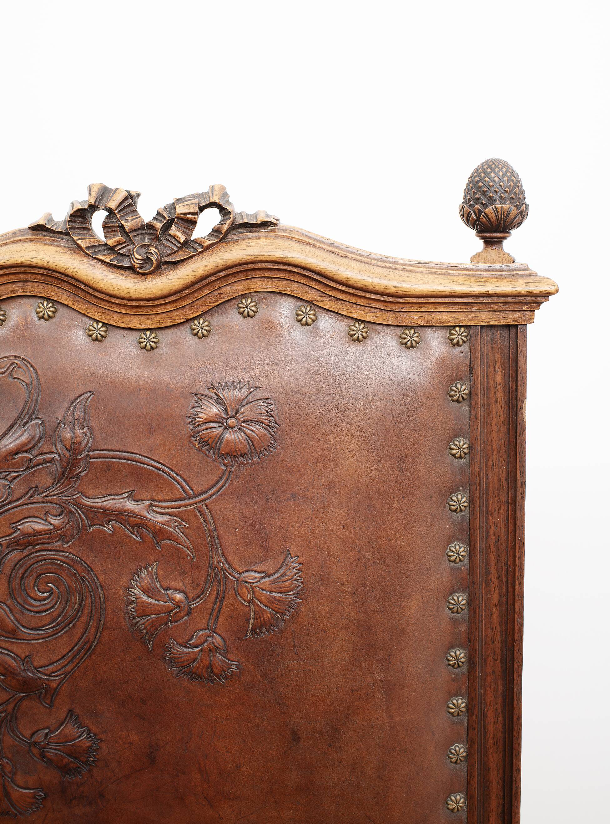 Set of 4 Louis XVI style chairs in carved wood and embossed leather.