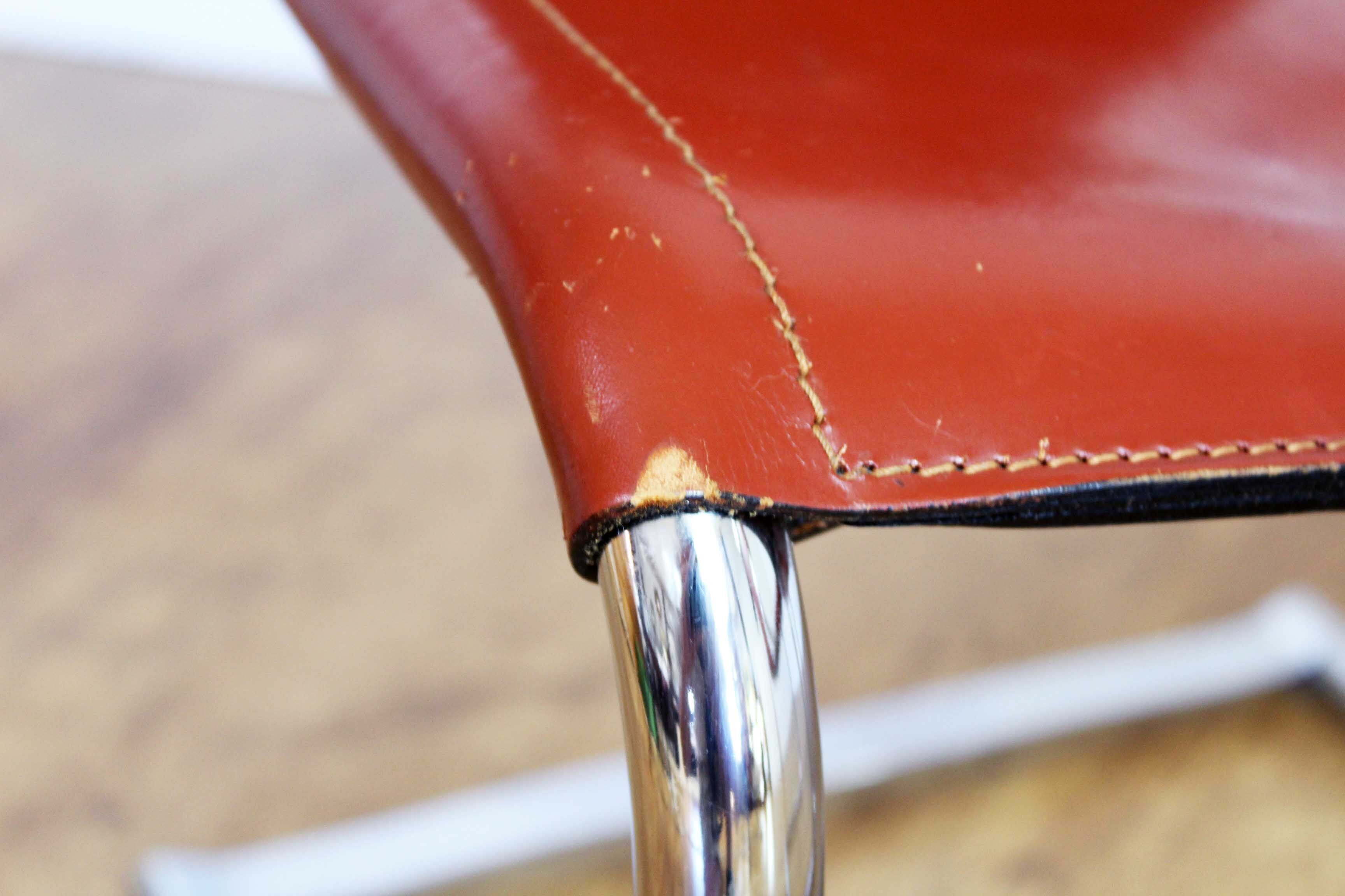 Pair of chairs in leather and chrome tube
