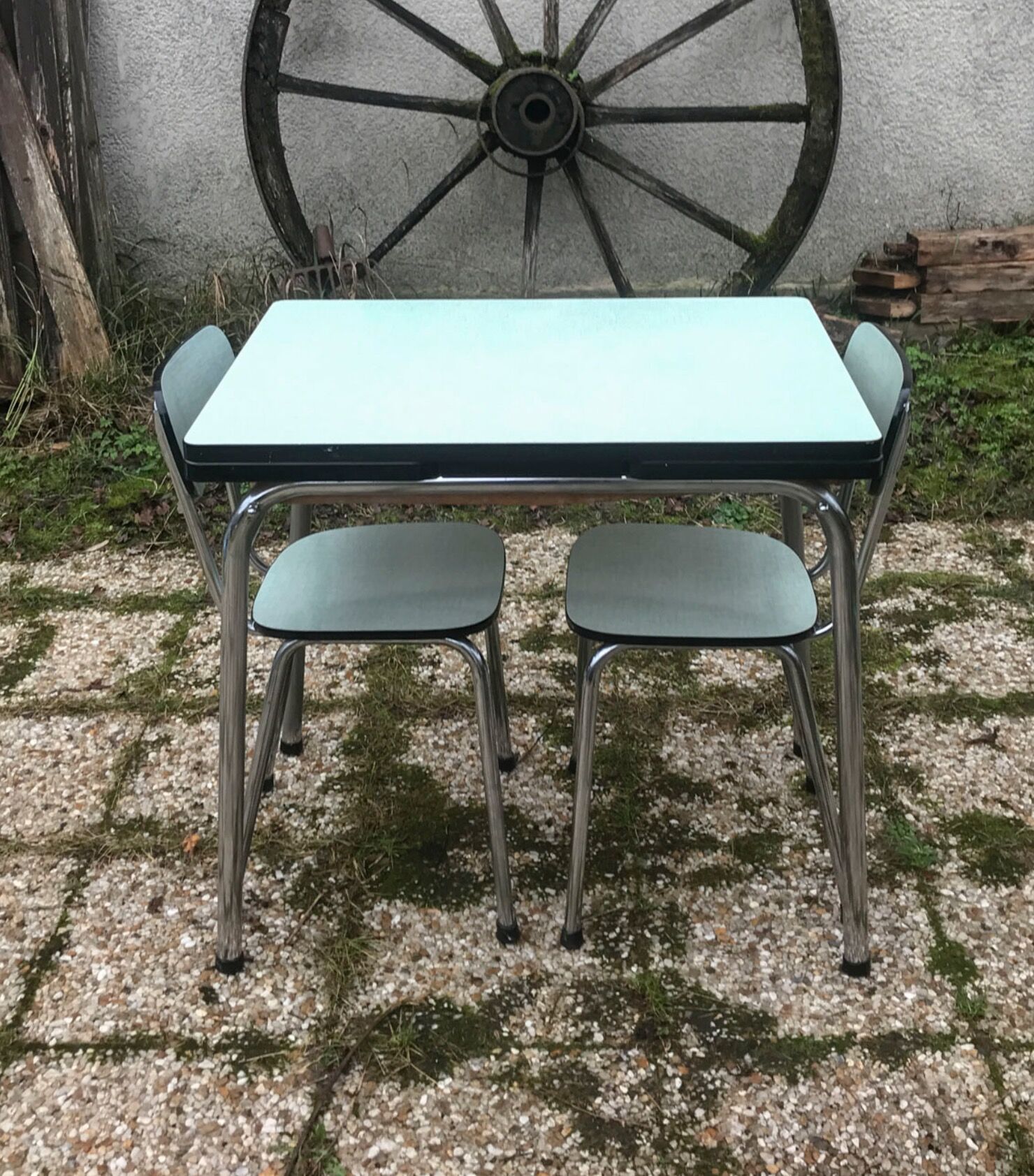 Table and chairs in water green formica