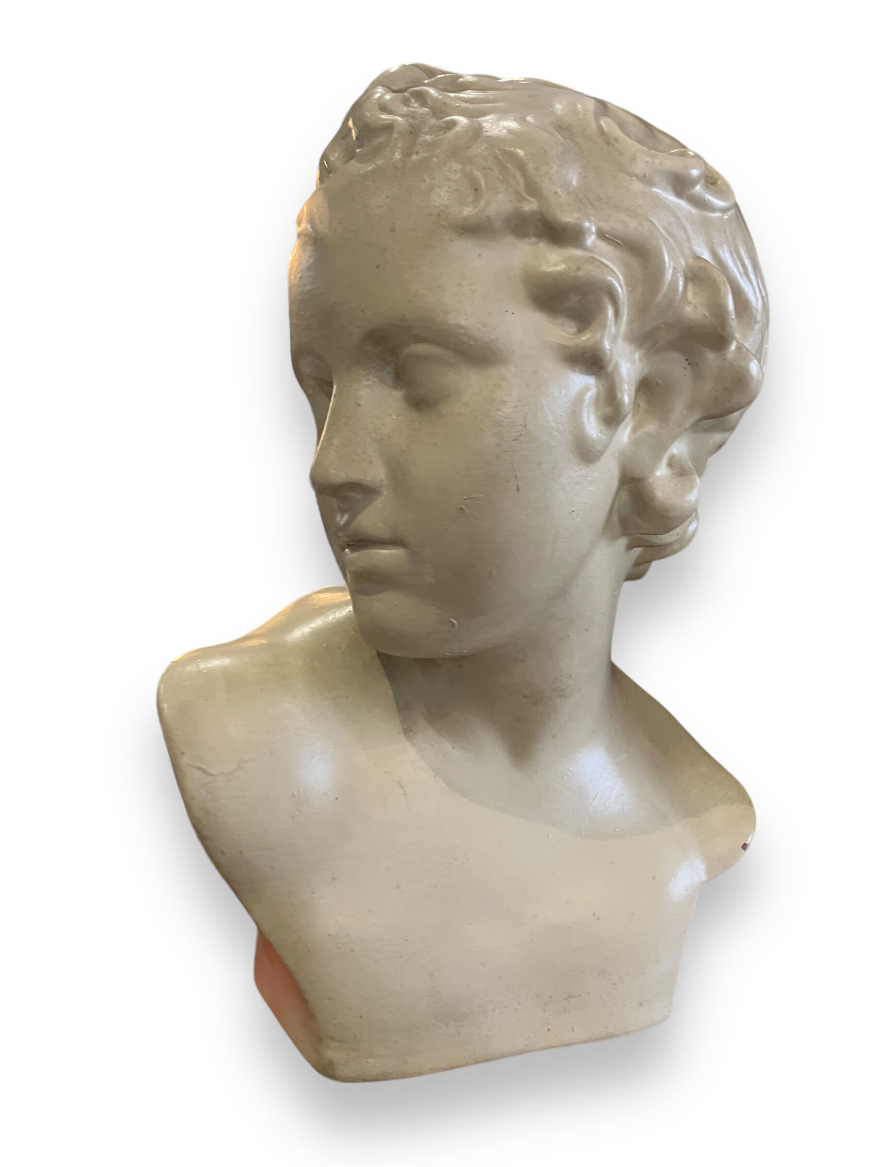 Bust of eros in glazed terracotta
