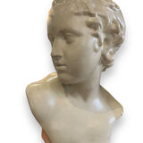 Bust of eros in glazed terracotta
