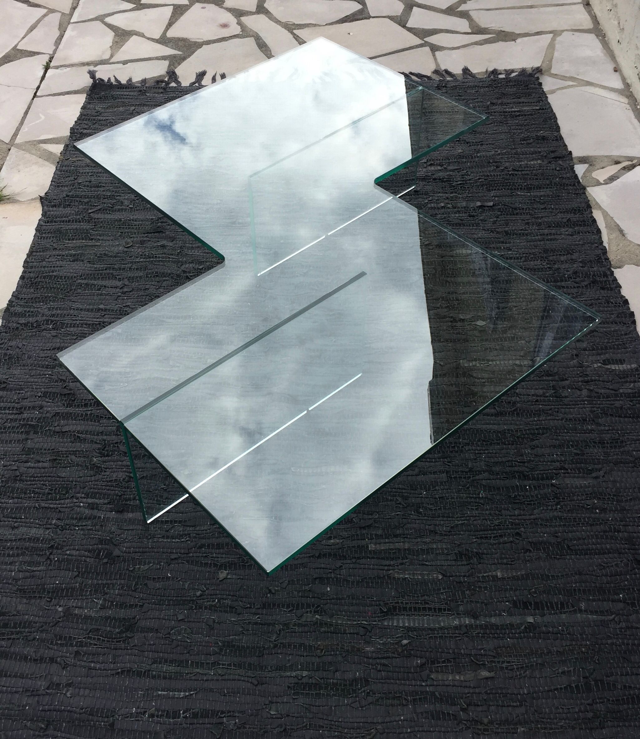 All-glass free-form coffee table