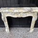 Louis XV style fireplace in purple breccia marble, circa 1880.