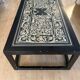 Lacquered wooden coffee table with a Scaglione marble top.