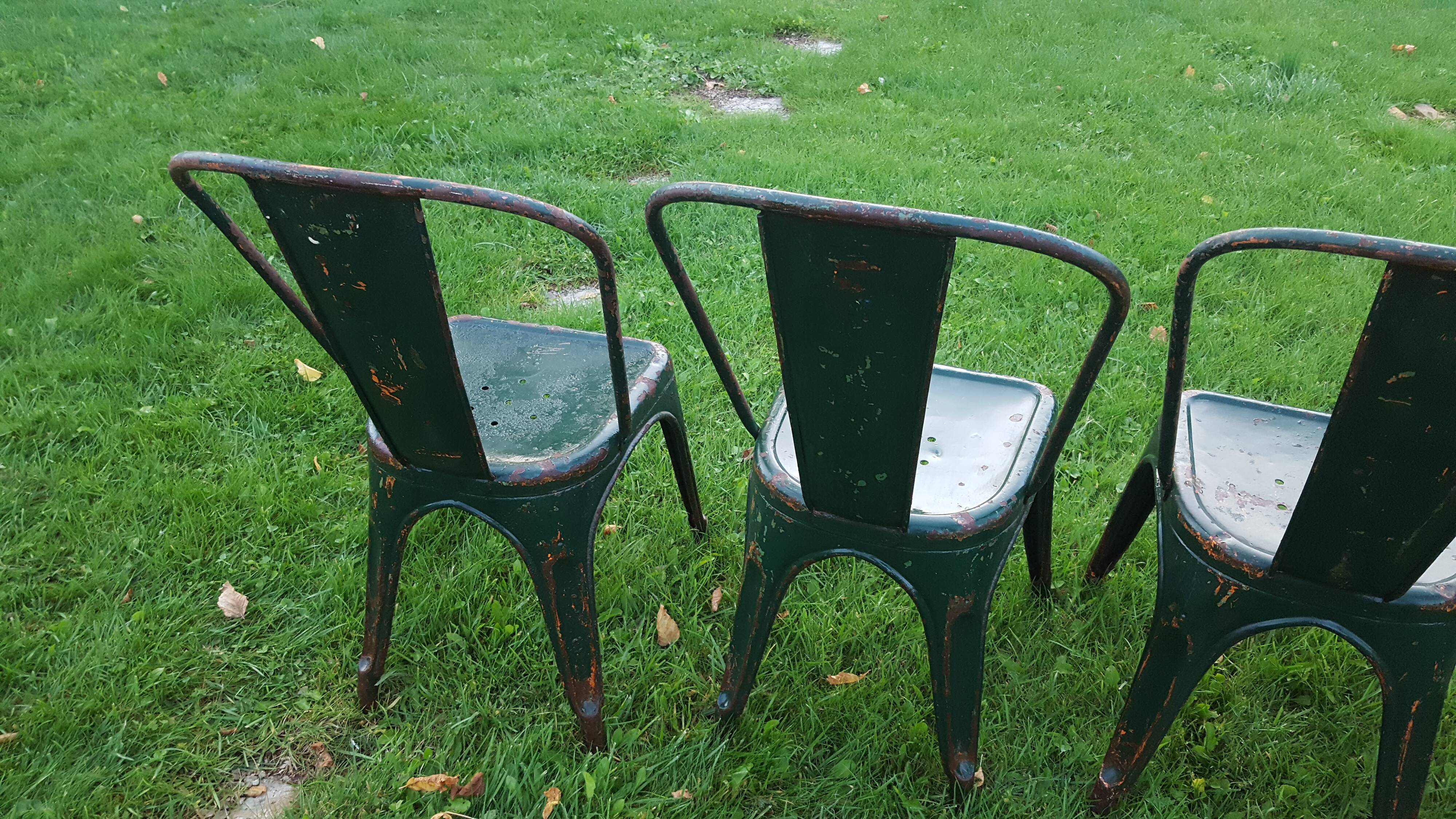 4 Green chaises Tolix industrial, first model (background)