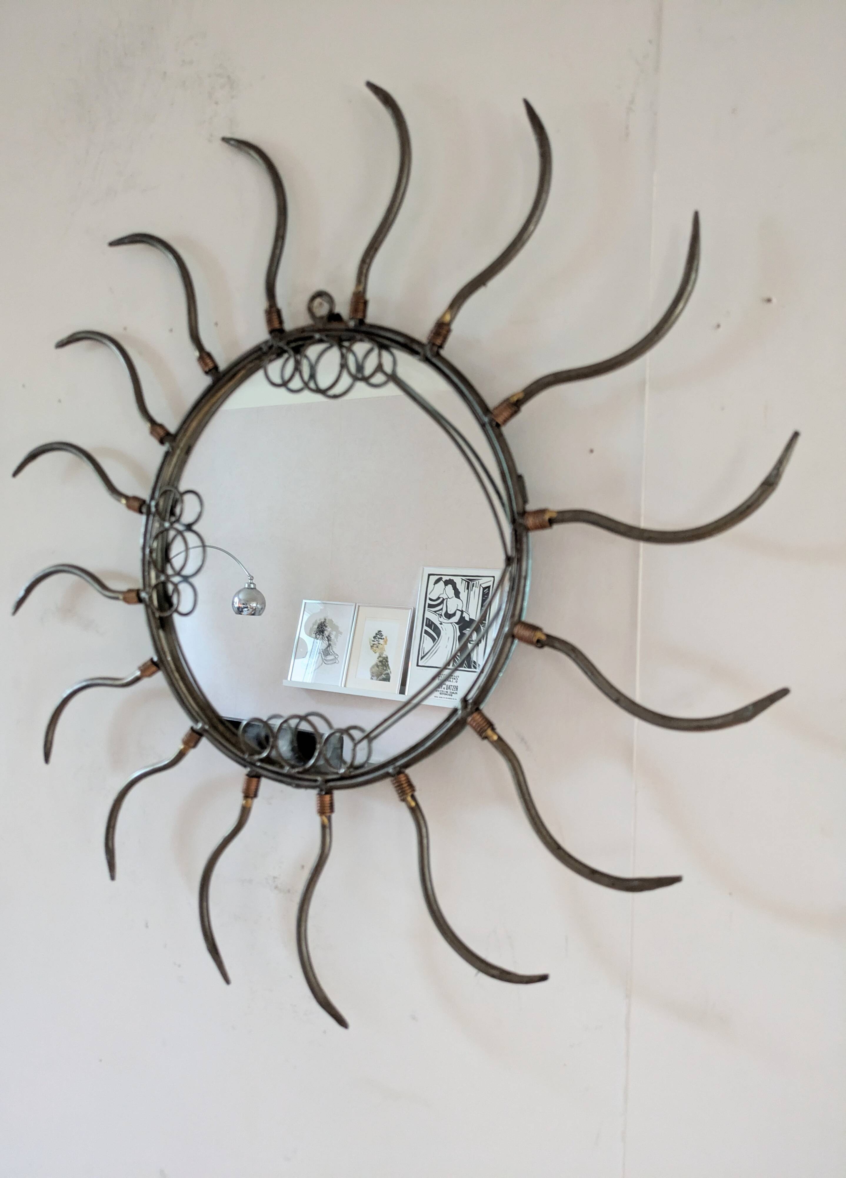 Metal sun mirror