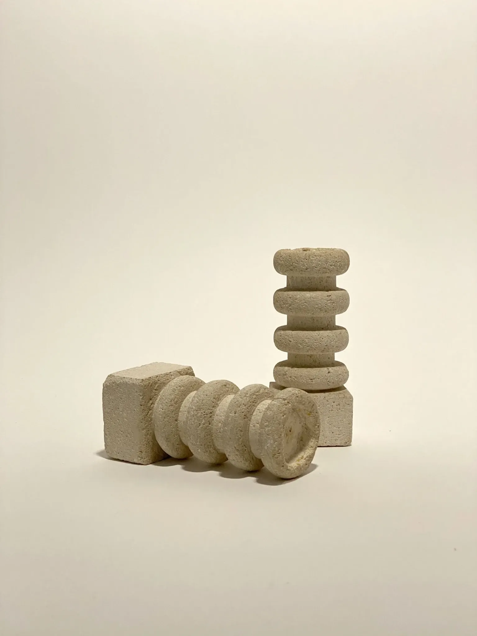 Pair of stone candle holders