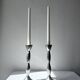 Pair of wavy aluminium candle holders