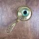 Vintage brass cellar rat, geometric handle in Art Deco style.