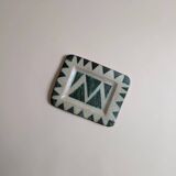 Ceramic pocket emptier