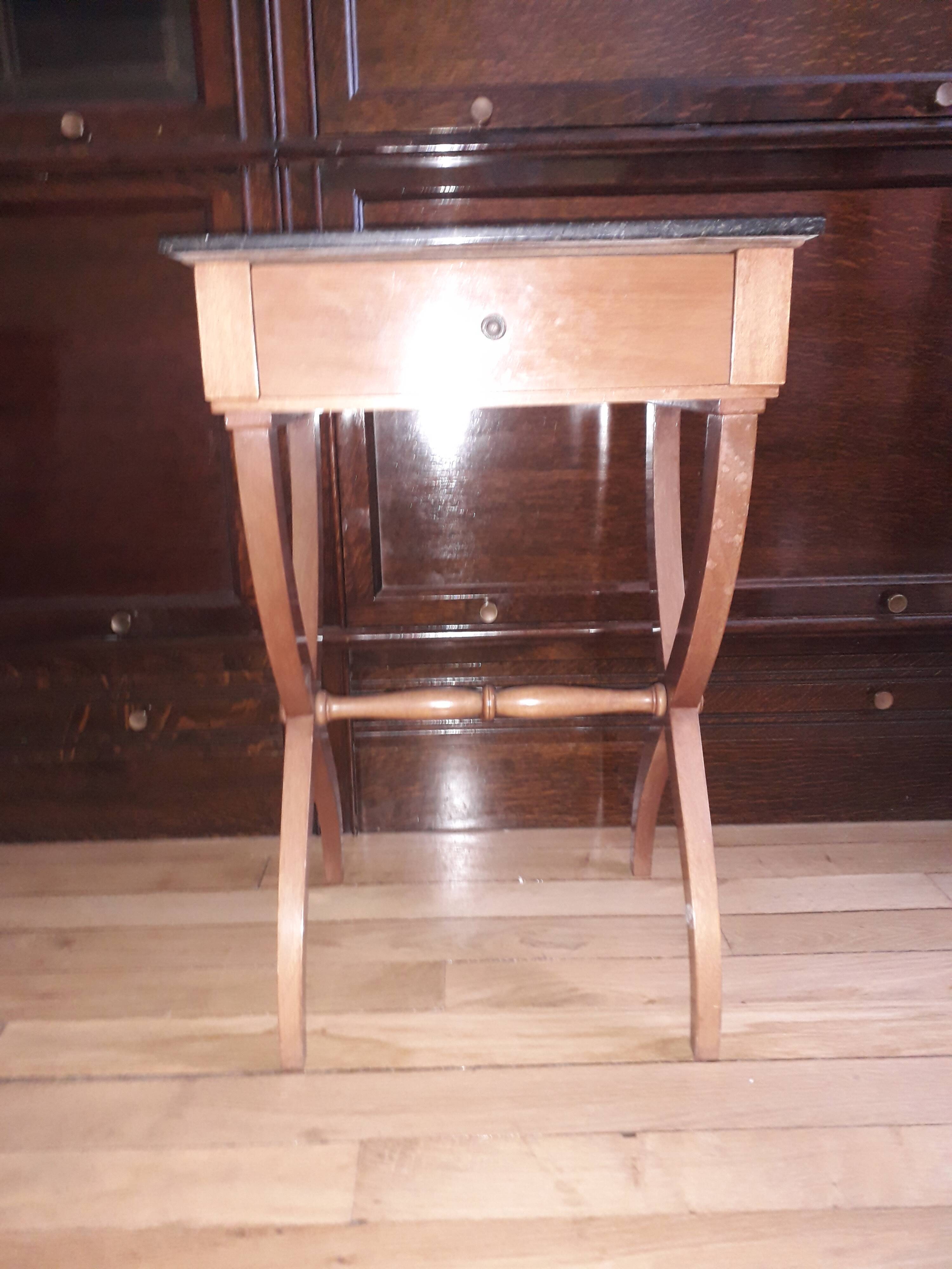 X-footed bedside pair