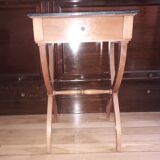 X-footed bedside pair