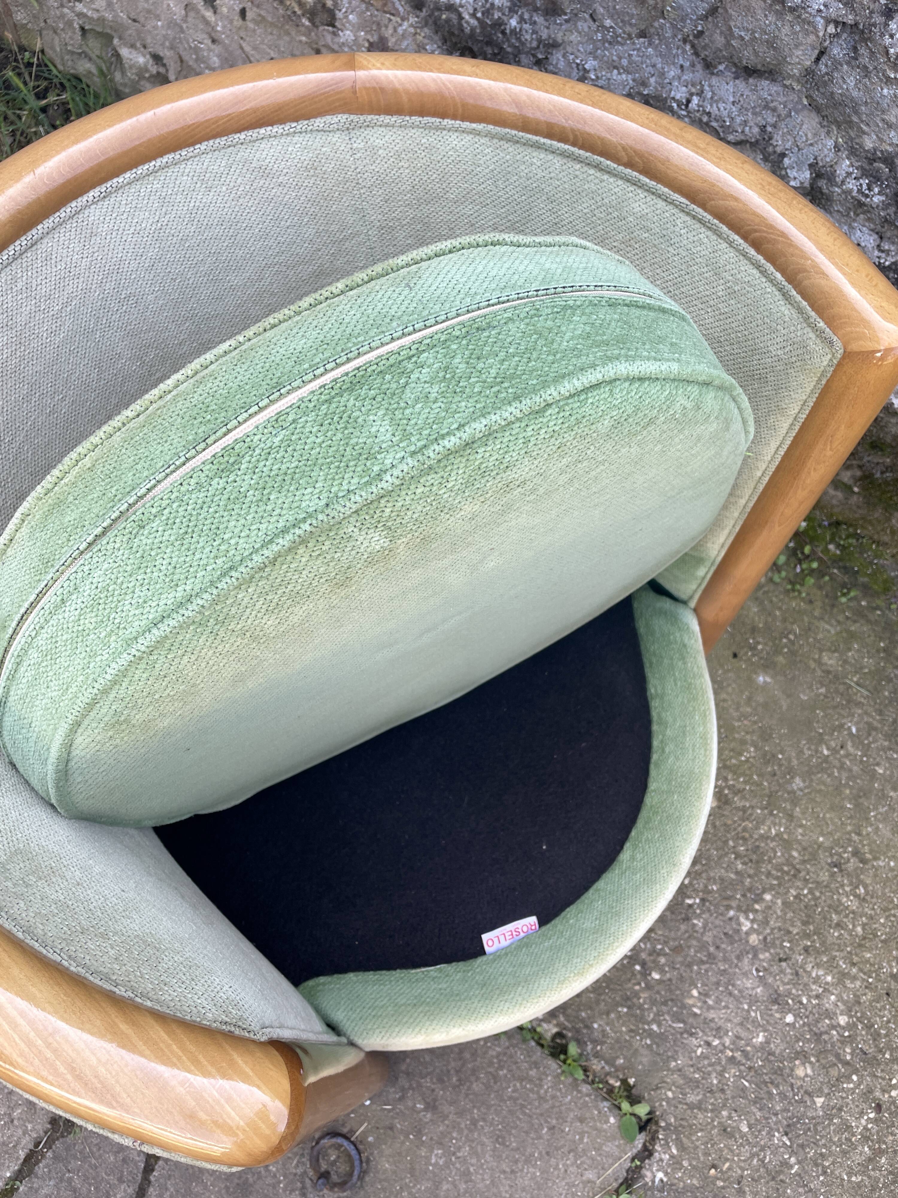 Pair of barrel-shaped armchairs in beech and almond green velvet by Maison Rosello