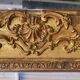 Antique Louis Philippe style gilded mirror decorated with floral motifs