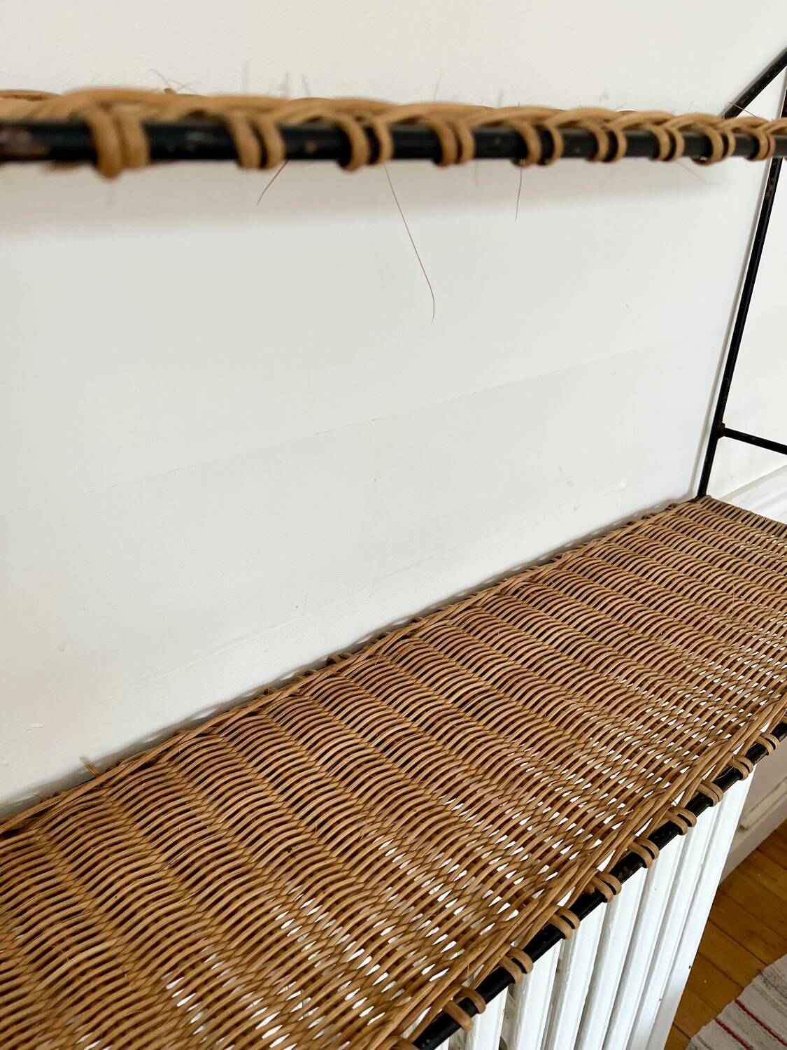 Raoul Guys rattan wall shelf 1950