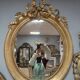 Oval mirror in gilded wood 93x73cm