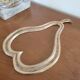 Dessous de plat poire en laiton