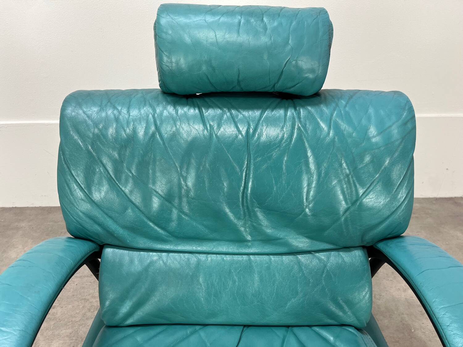 Postmodern design armchair and ottoman, 80s leather
