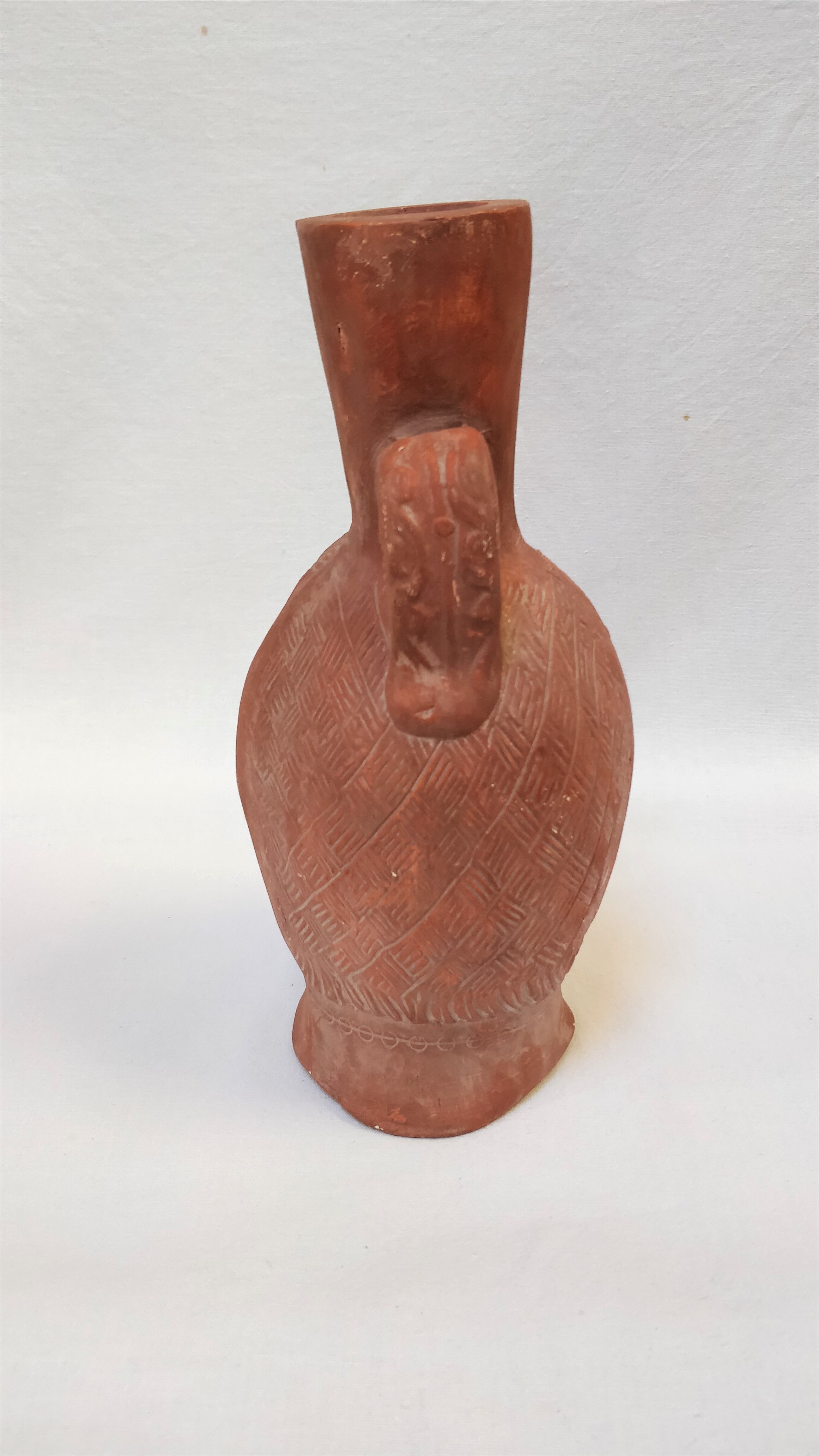 Jug vase with human head