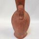 Jug vase with human head