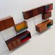Large colorful wall unit in luxury wood