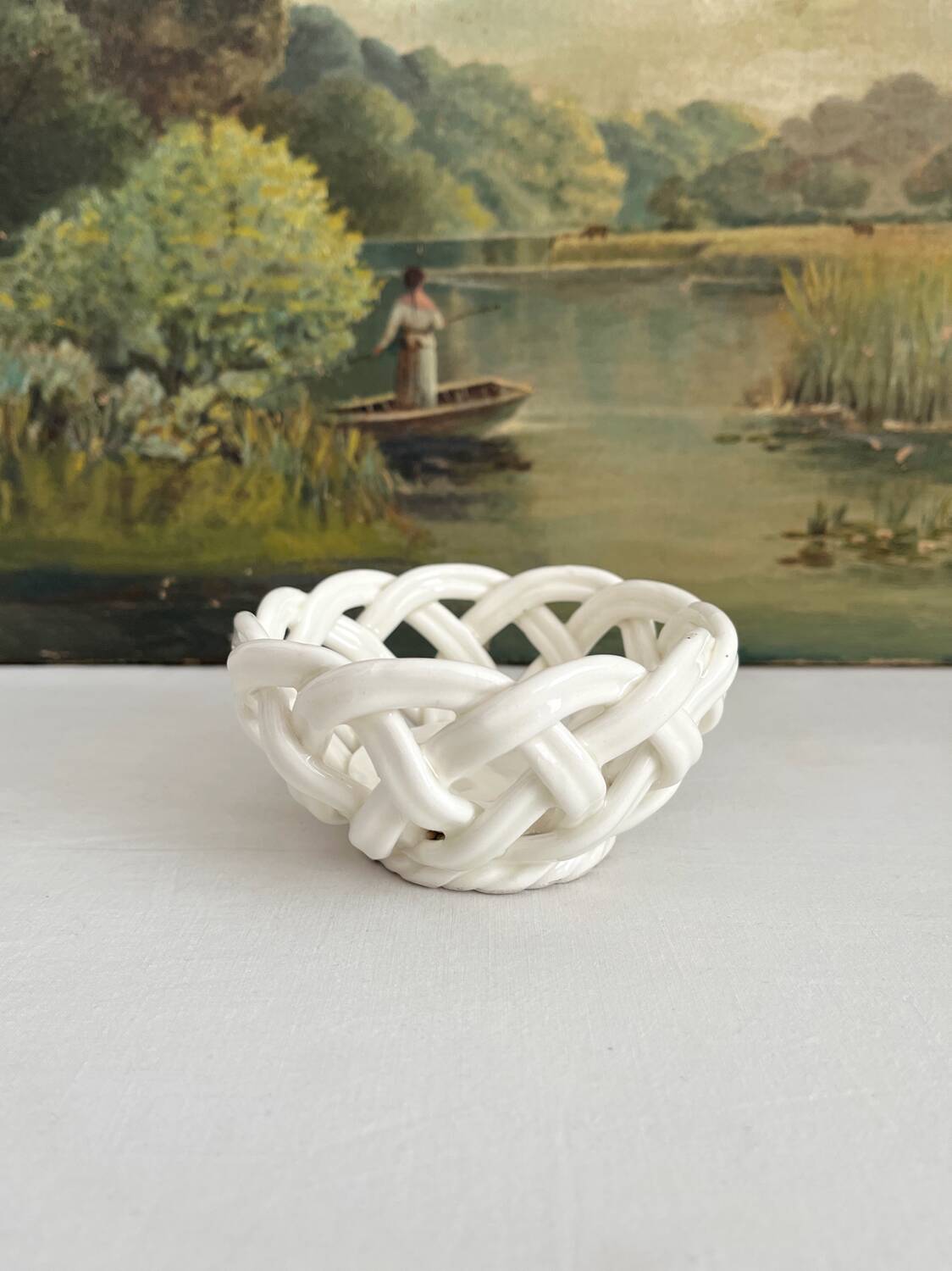 Small vintage white woven ceramic basket