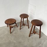 Trio of old tripod stools