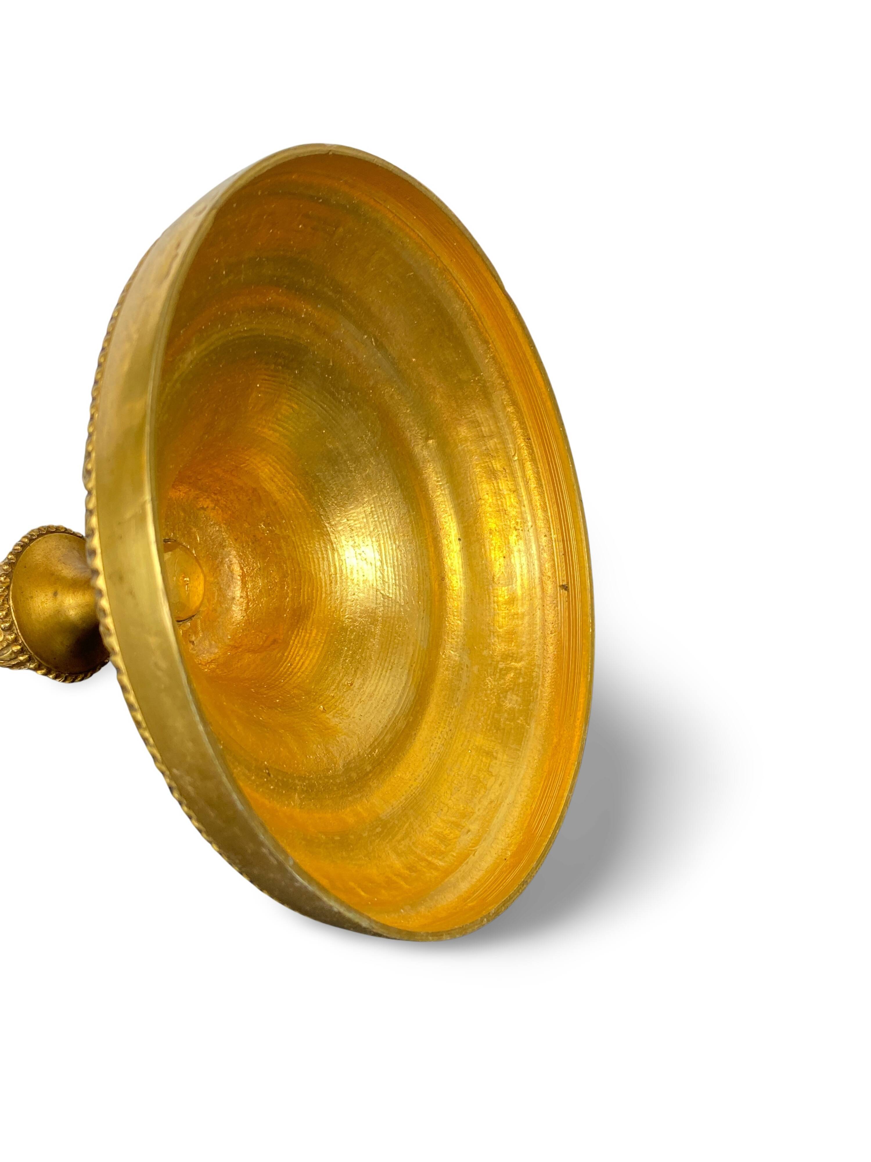 Louis XVI period candlestick in chiseled gilt bronze