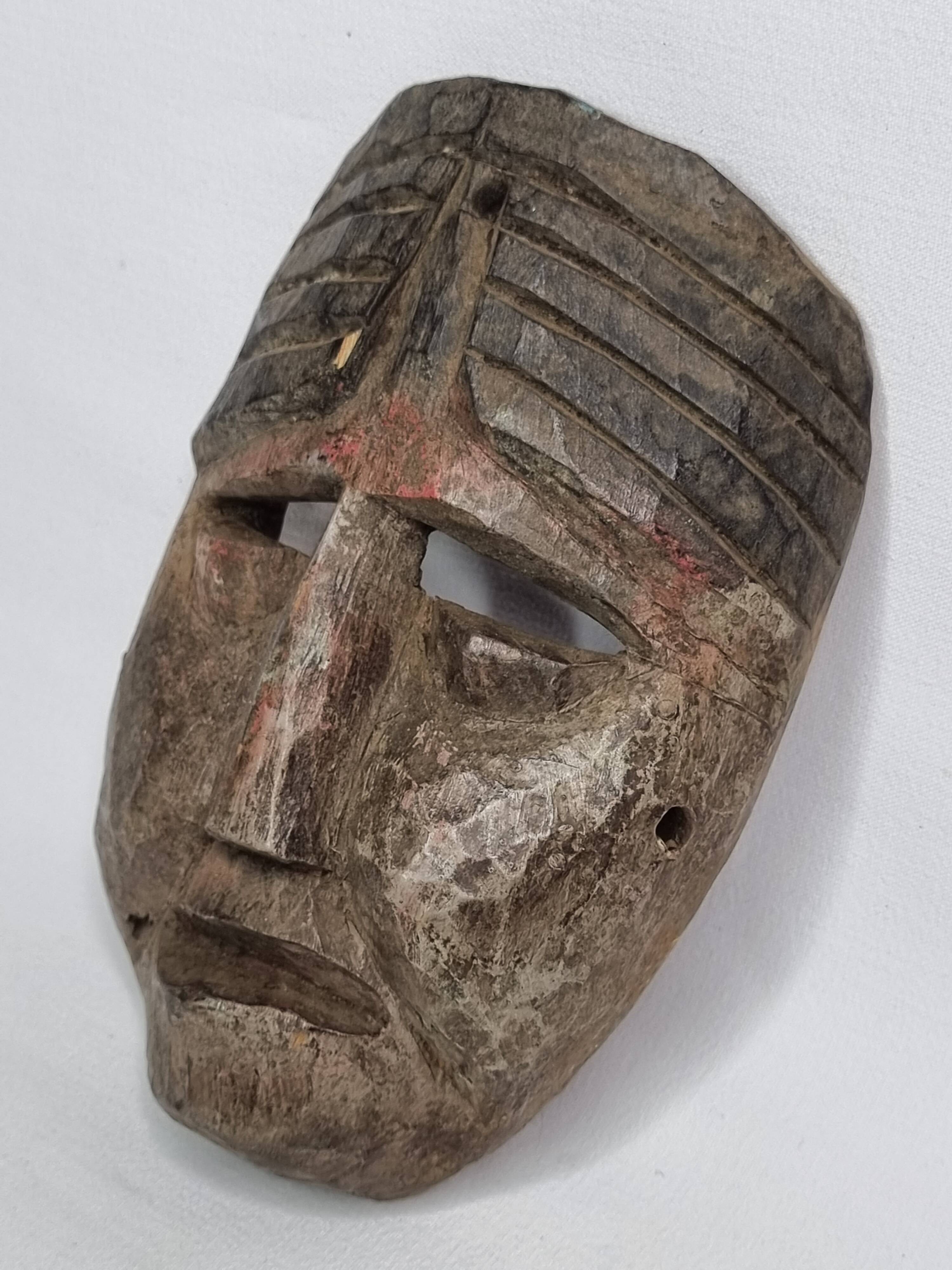 Antique ritual mask in carved wood, Himalayas, 20th century – 19 cm