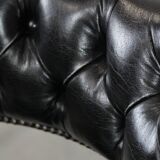Adjustable black timeless Chesterfield office chair made of cow leather