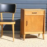 Furniture with 1 door and 1 drawer in light oak.