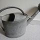 old zinc deco watering can