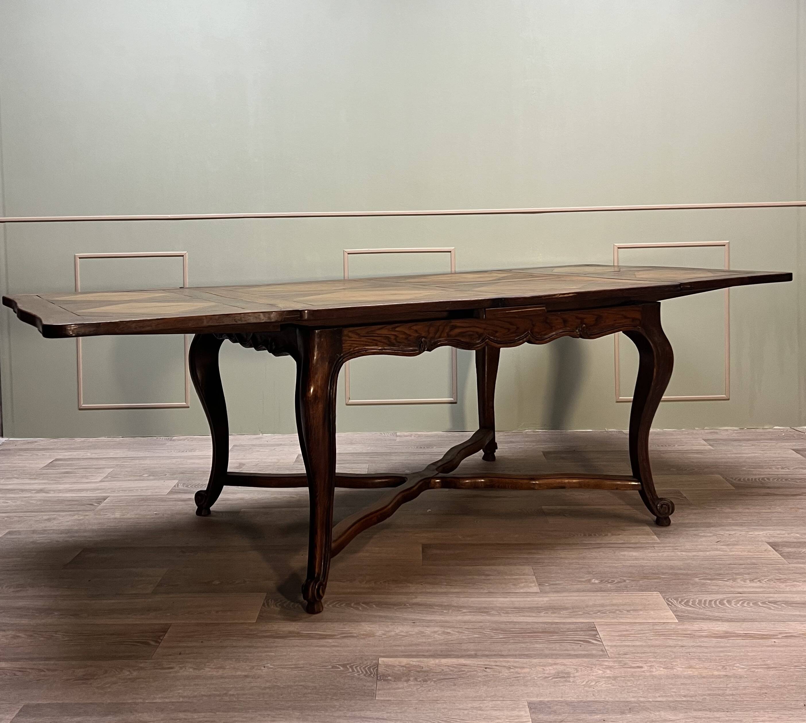 Dining room table in natural wood called italian style with parquet top 19th century