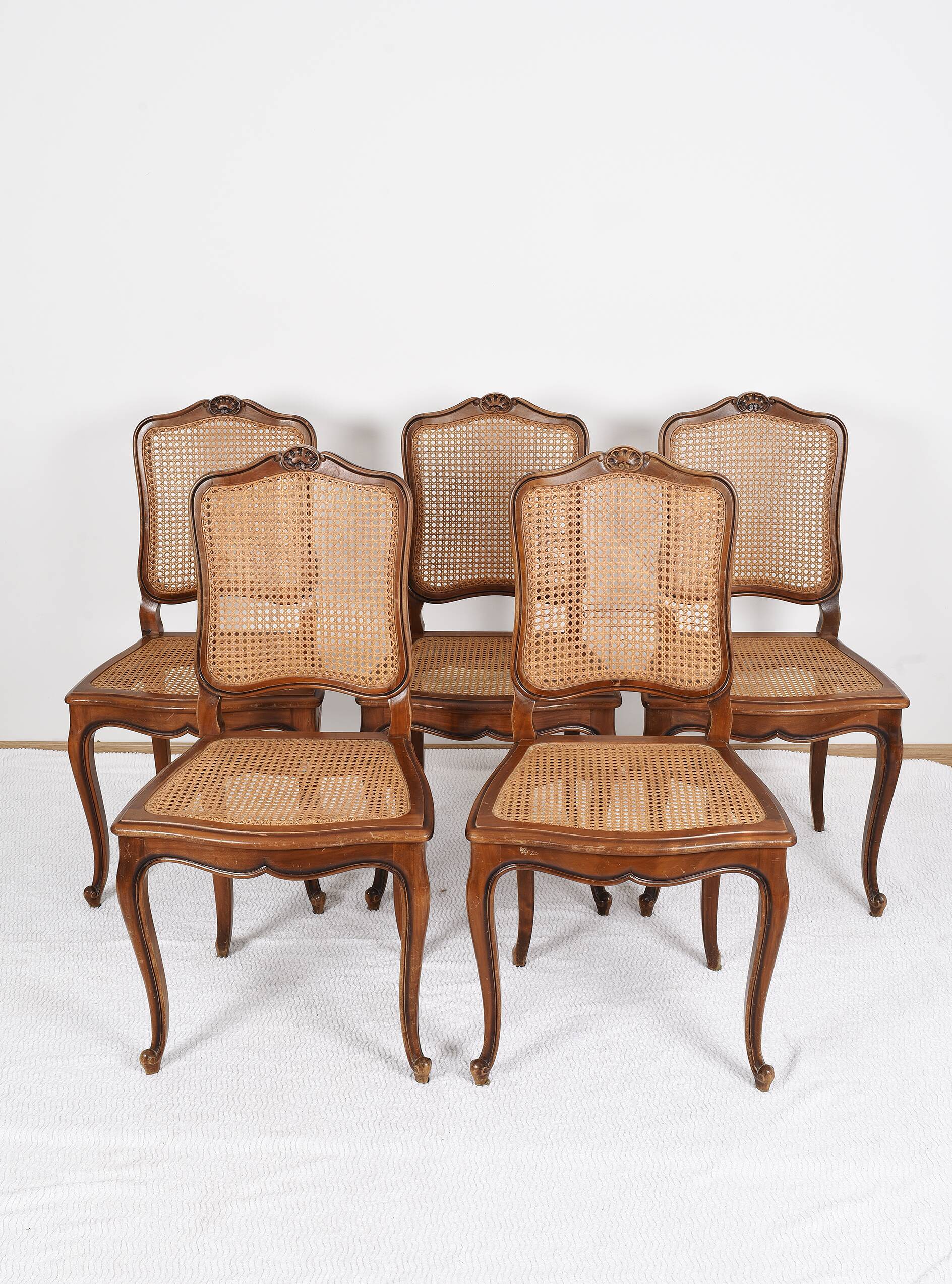 Series of 5 cane chairs, backs and seats, Louis XV style