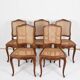 Series of 5 cane chairs, backs and seats, Louis XV style