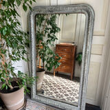 Antique mirror in stucco and wood
