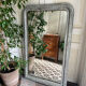 Antique mirror in stucco and wood