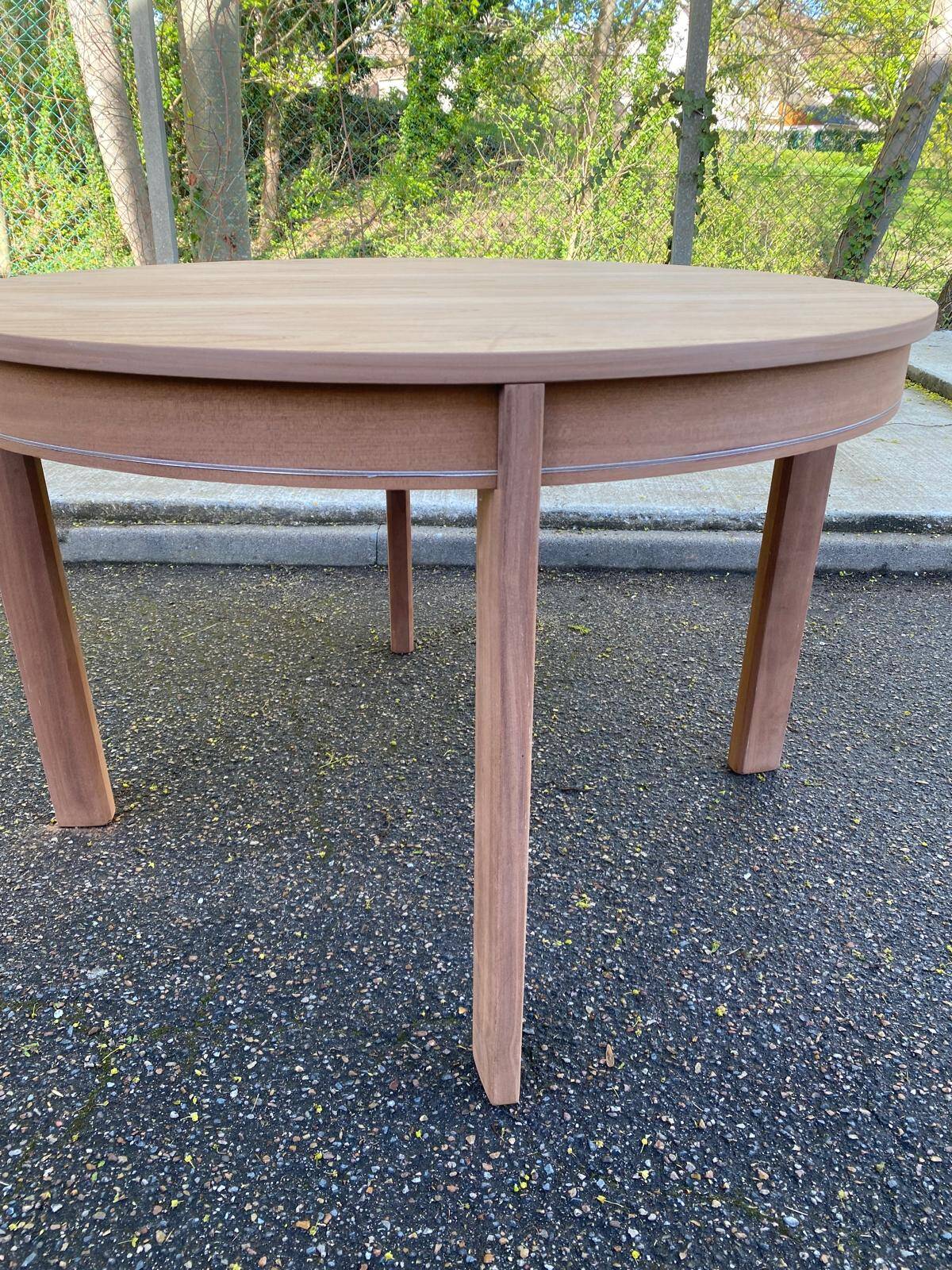 Renovated round extendable Scandinavian dining table in teak, 153cm.