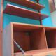 Wall shelving system and teak writing box. of Poul Cadovius. Denmark 1960