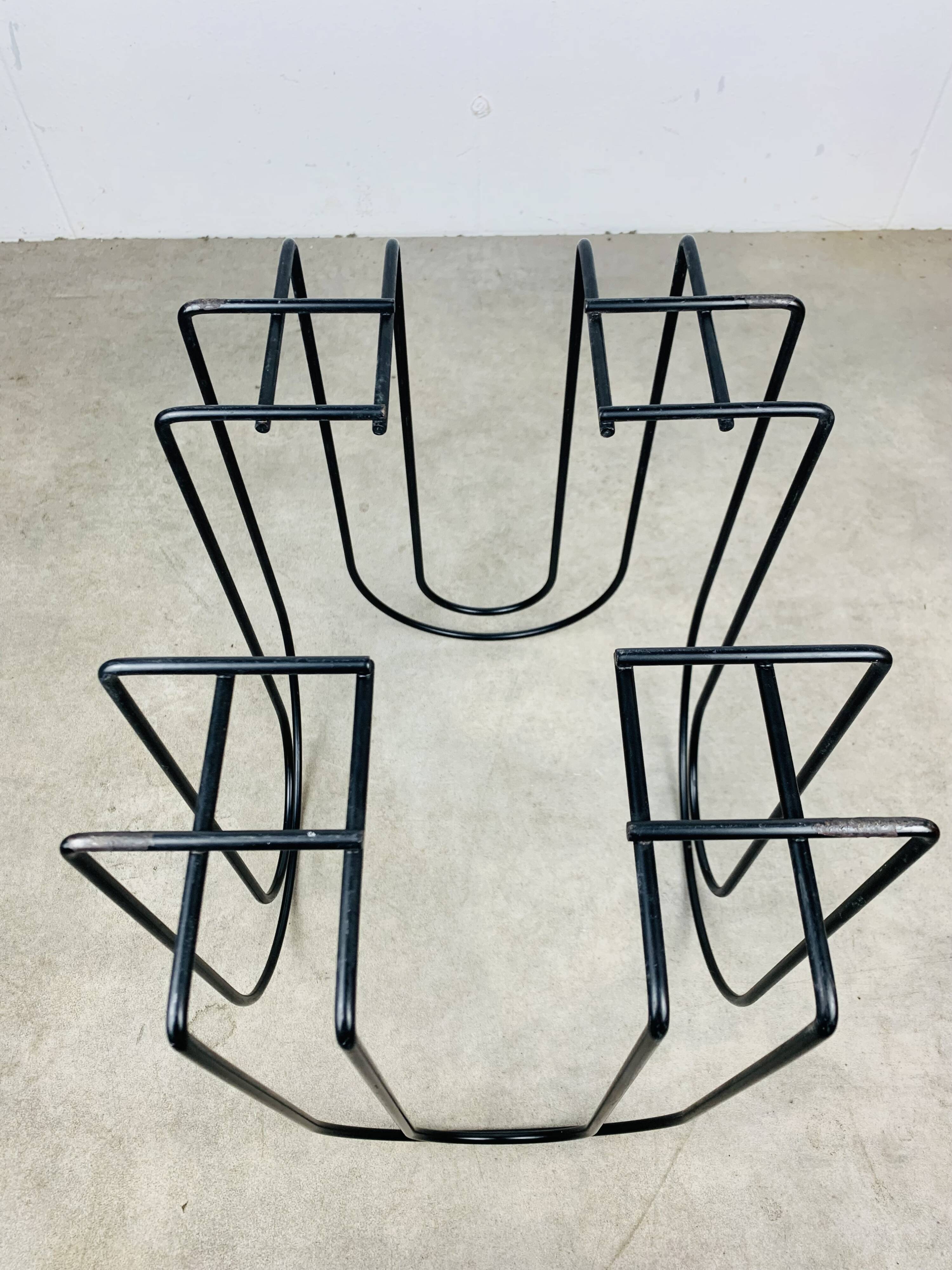 Postmodern metal magazine rack, black, 1980s.