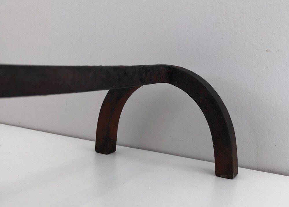 Pair of modernist bronze and wrought iron andirons