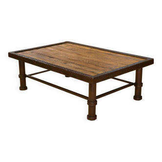 Brutalist coffee table made of wood and wrought iron from the 1960s.