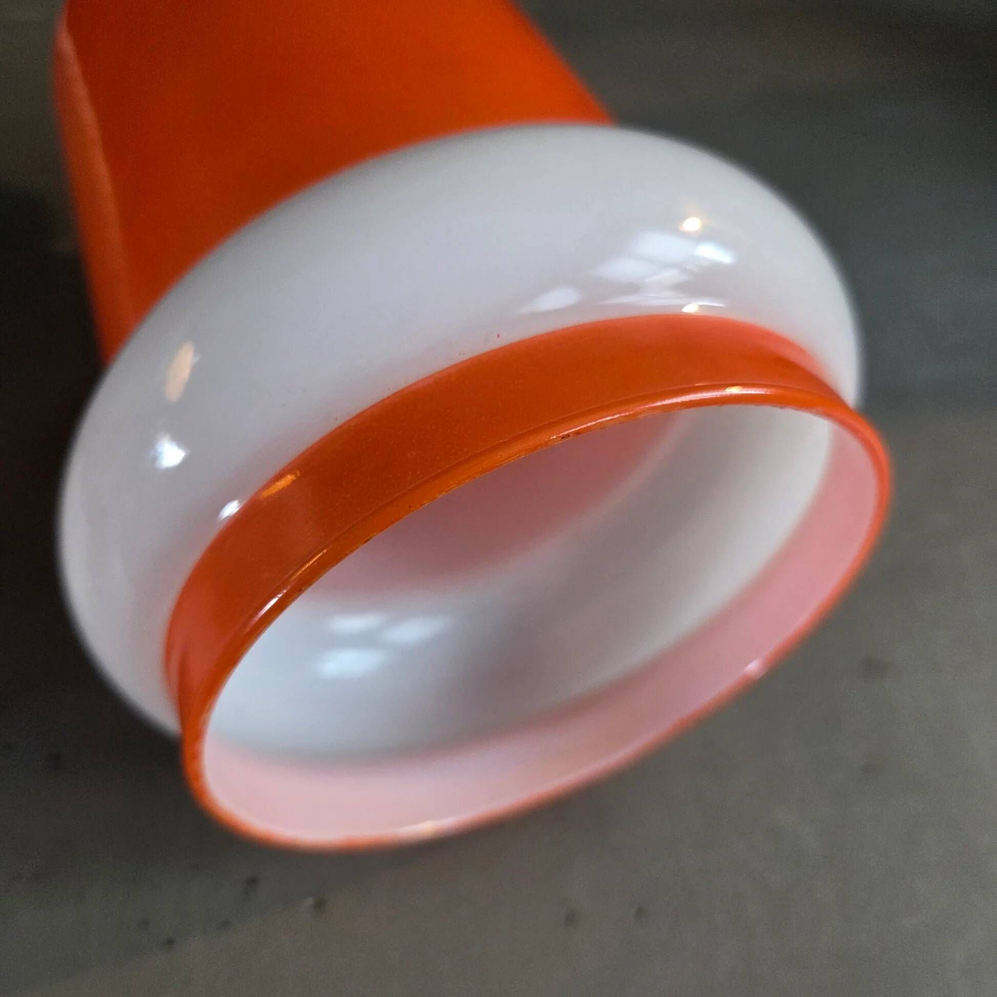 Vintage suspension in orange and white glass.