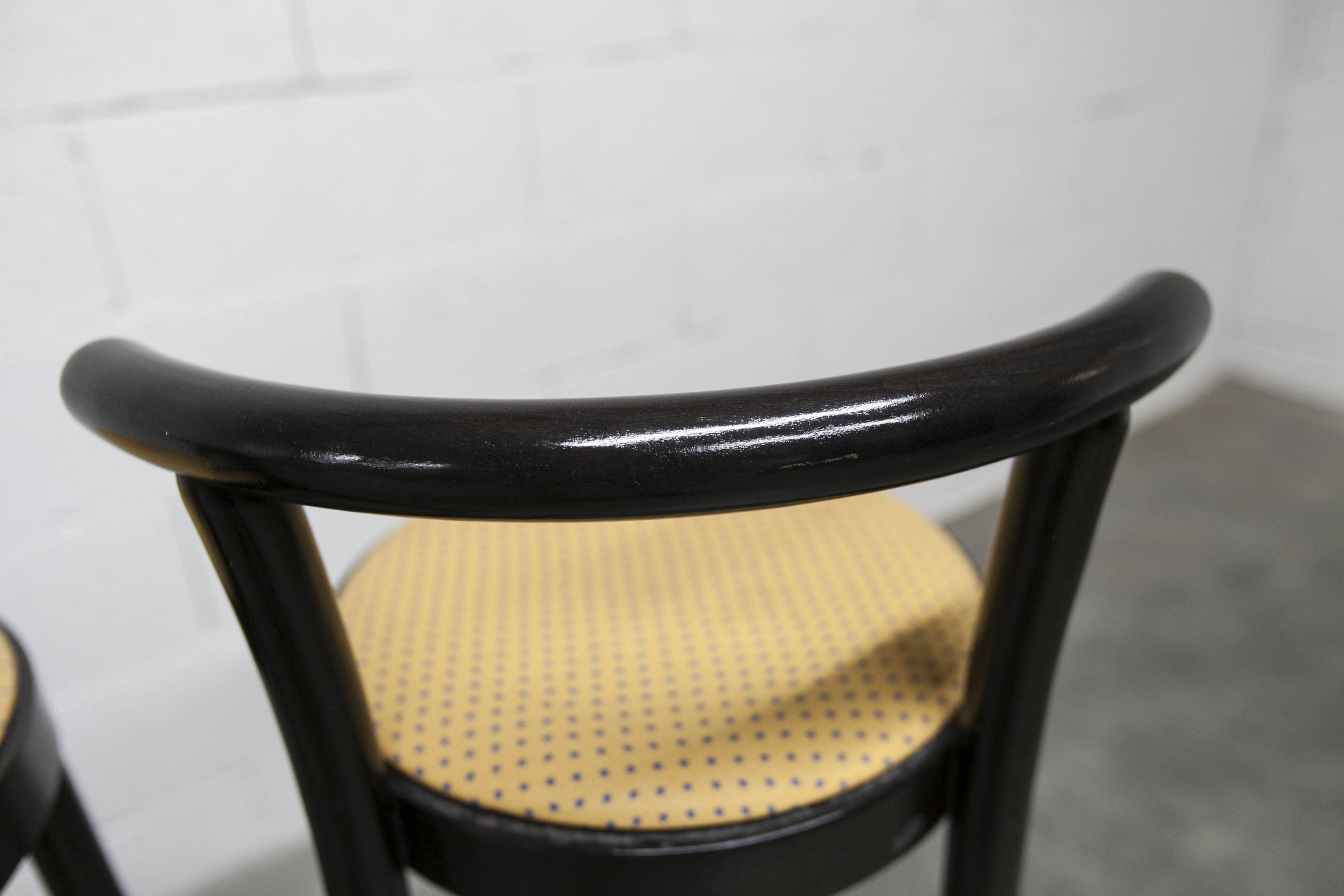 Pair of Baumann stools model Dialog in black and yellow and blue faux leather 1990