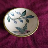 Empty pocket in brass and ceramic bird pattern